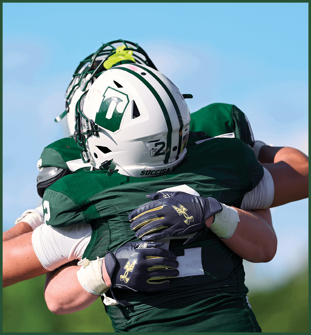 A football player running on the field. Description generated by AI