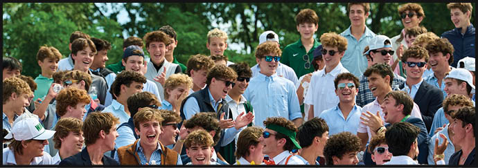 A group of people are sitting in the bleachers. Description generated by AI