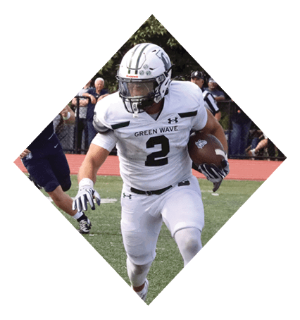 A football player wearing a black jersey with the number 3 kneels on the field. AI generated content