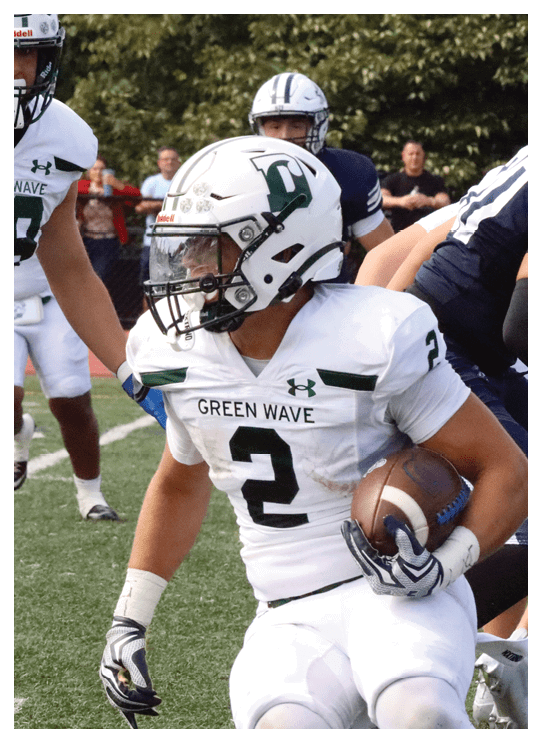 A football player wearing a helmet and white uniform is holding his helmet above his head. AI generated content