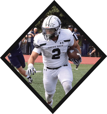 A football player wearing a black jersey with the number 3 kneels on the field. AI generated content