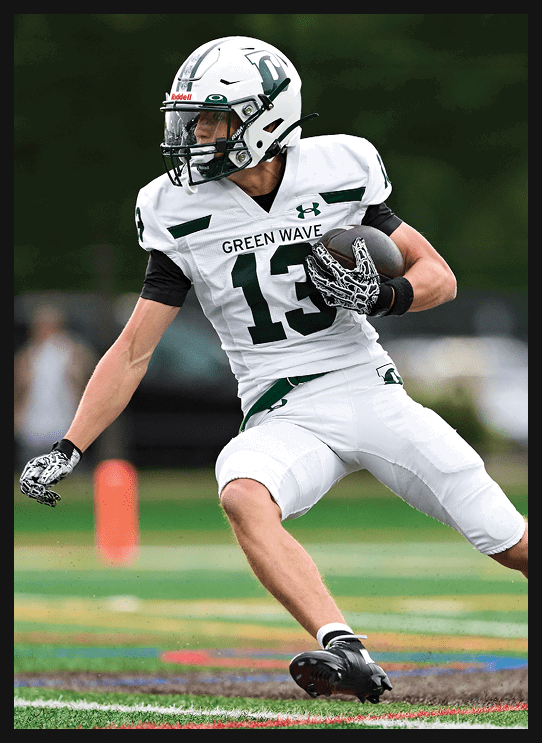 A football player wearing a helmet and white uniform is holding his helmet above his head. AI generated content