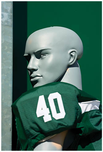 A football game is being played on a field. Description generated by AI