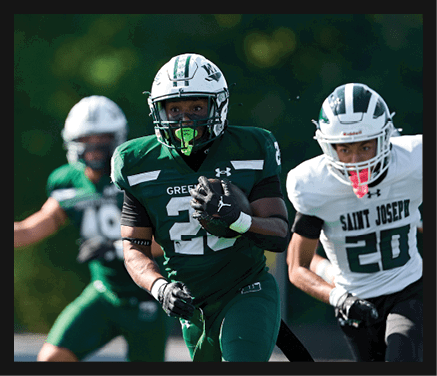 Two football players celebrating a touchdown with one player jumping in the air. AI generated content