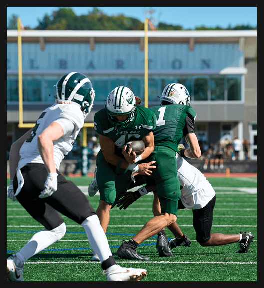 Two football players wearing Vista jerseys and holding hands. AI generated content