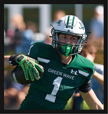 A football player in a white jersey with the number 85 on it is trying to catch a football. AI generated content