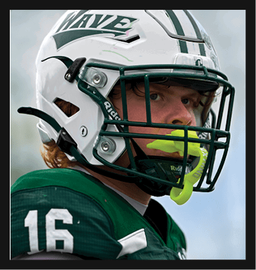 Two men wearing football helmets are talking to each other. AI generated content