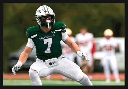 A group of football players wearing headphones and smiling. AI generated content