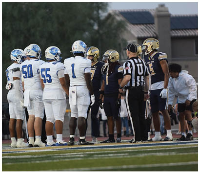 A group of football players wearing blue and white uniforms are standing on the field. AI generated content