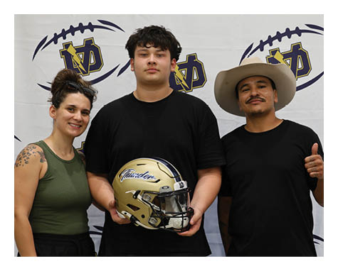 Three people pose with a football helmet. AI generated content