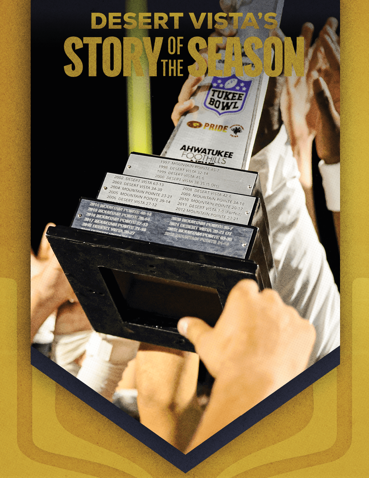 An adult in a sports uniform is holding up a large trophy while other hands reach towards it, with the text Desert Vista's Story of the Season displayed above. Description generated by AI