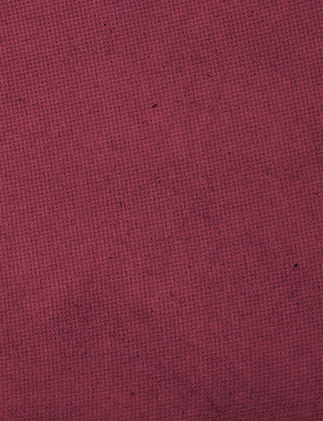 A red fabric with a pattern. Description generated by AI
