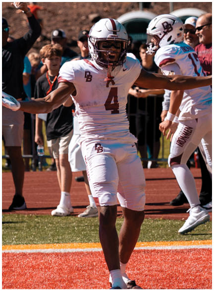 A football player wearing a blue jersey with the number 58 on it. Description generated by AI