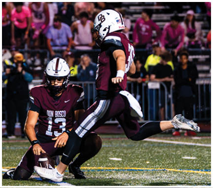 A football player running on the field. Description generated by AI