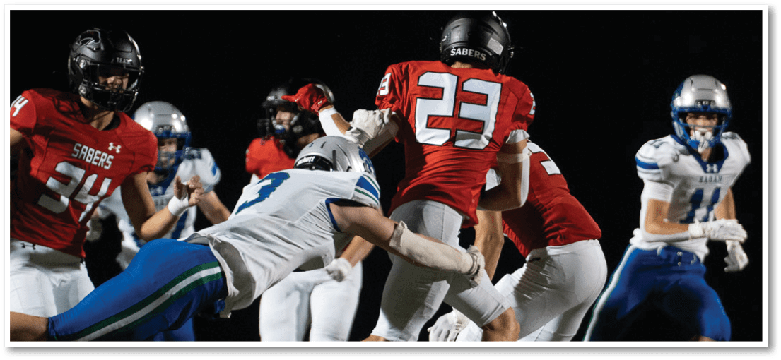 A football player running on the field. Description generated by AI
