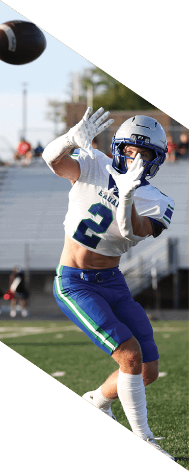A football player wearing a white jersey with the number 86 catches a football in the air. AI generated content