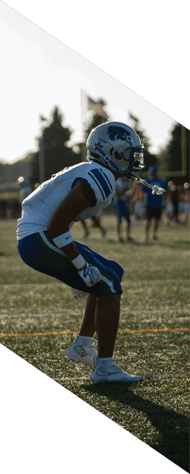 A football player wearing a white jersey with the number 86 catches a football in the air. AI generated content
