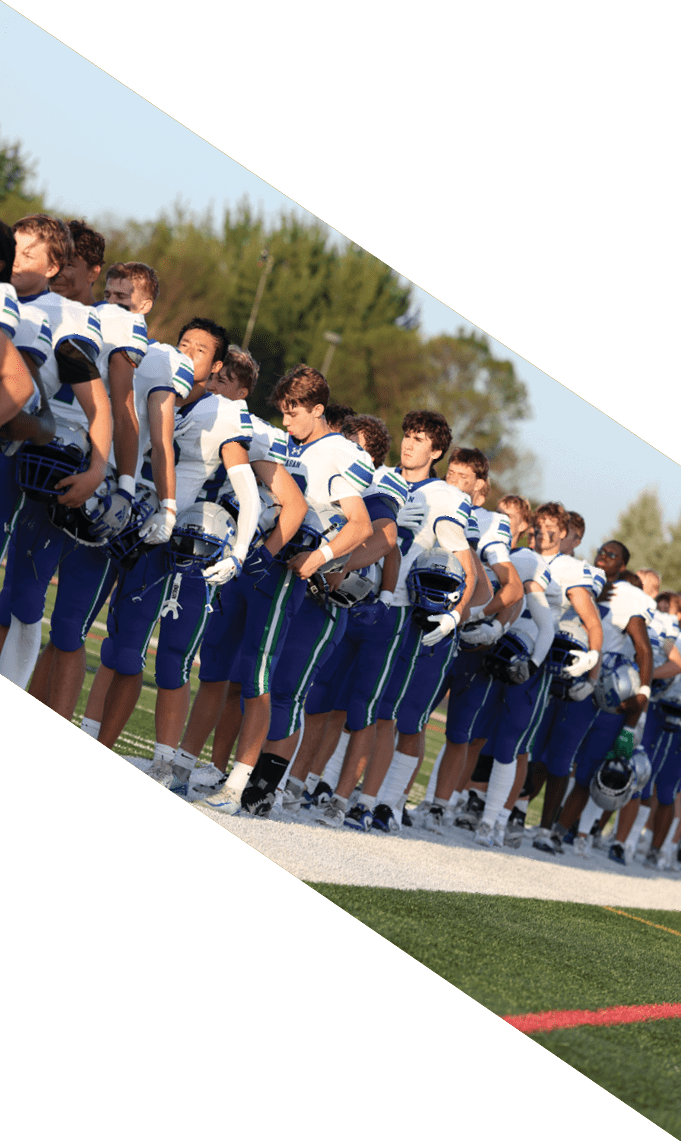 Three men wearing football uniforms are posing for a picture. AI generated content