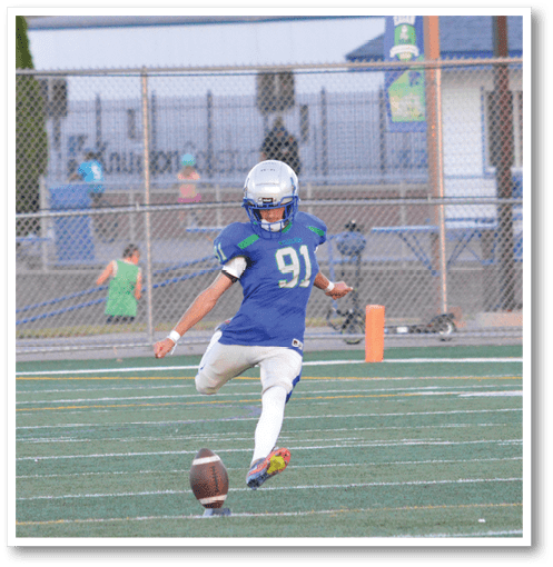 Two football players wearing black jerseys with the number 11 on them. Description generated by AI