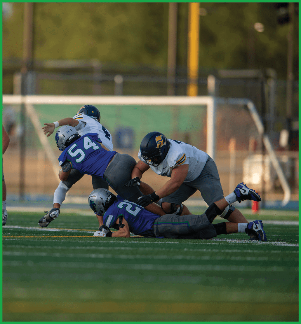 A football player running on the field. Description generated by AI