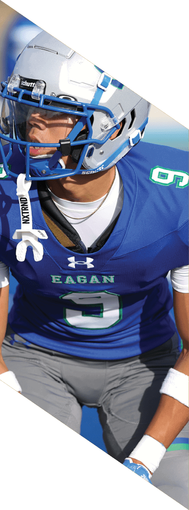 Two young men wearing football uniforms and making hand gestures. AI generated content