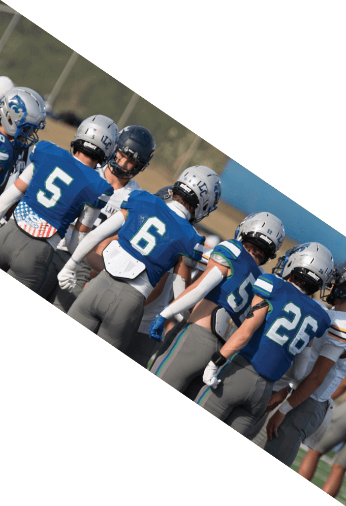 Three football players wearing green uniforms and black helmets pose for a photo. AI generated content