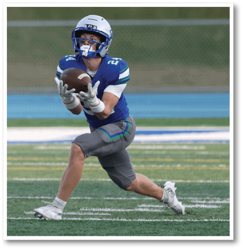 Two football players wearing black jerseys with the number 11 on them. Description generated by AI