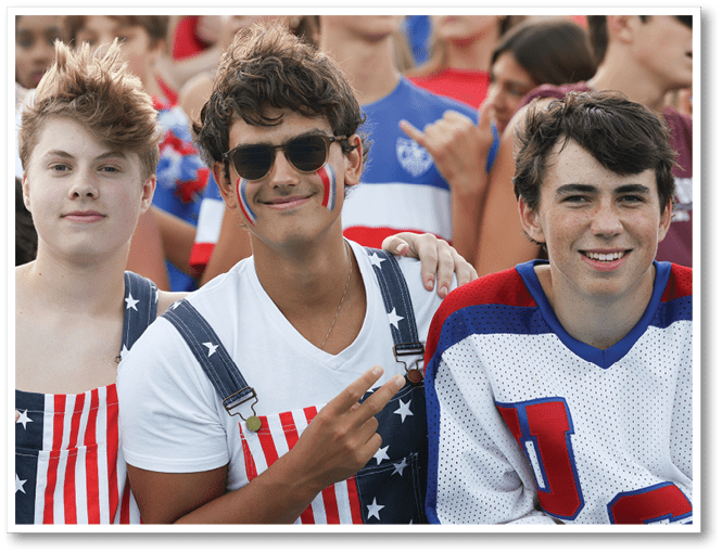 A group of football players wearing black jerseys with the number 3 on them. Description generated by AI