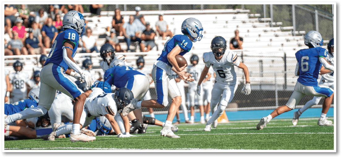 A football player running on the field. Description generated by AI