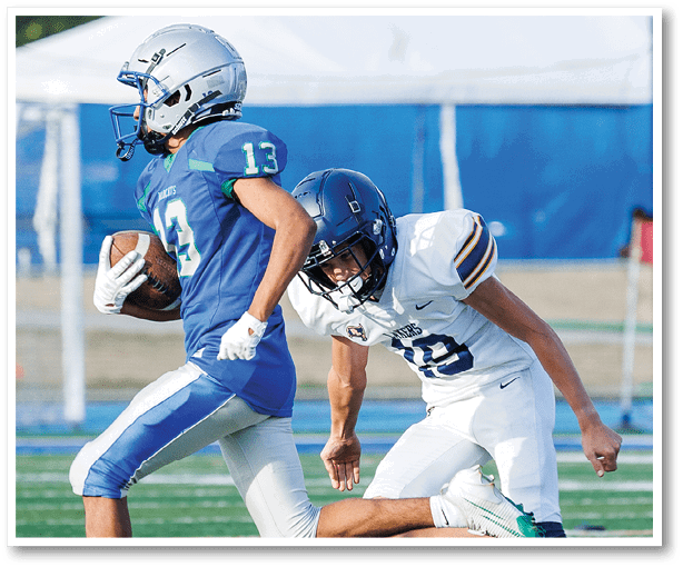 A football player is kicking a football on a field. Description generated by AI