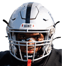 A young man wearing a white jersey with the number 10 on it. Description generated by AI