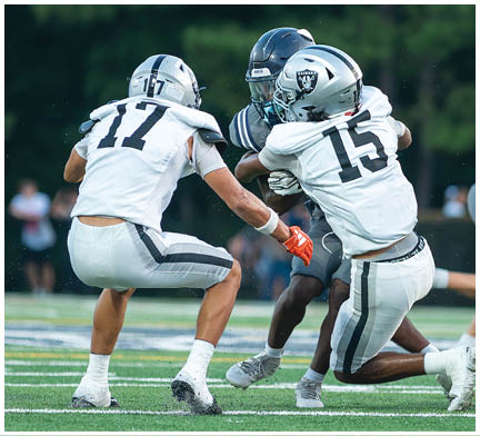 A football player running on the field. Description generated by AI