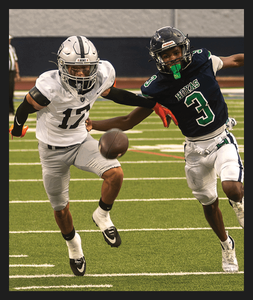 A football player in a white uniform is running with a football in his hand. AI generated content