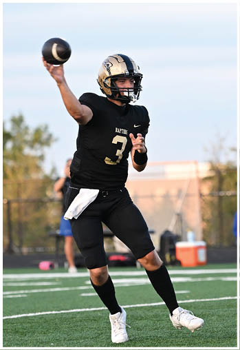 A football player running on the field. Description generated by AI