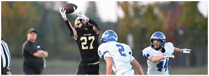 A football player is sliding on the ground. Description generated by AI