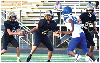 A football player running on the field. Description generated by AI