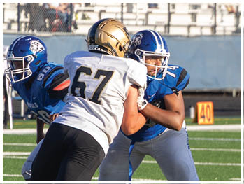 A football player running on the field. Description generated by AI