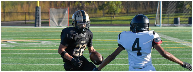 A group of football players on a field. Description generated by AI