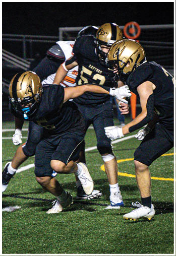 A football player running on the field. Description generated by AI