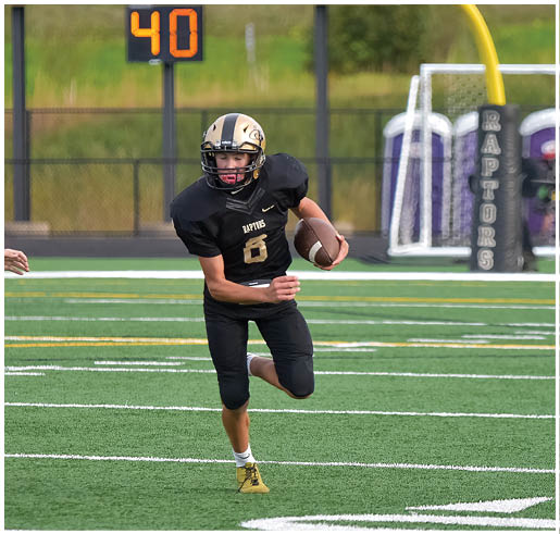 A football player running on the field. Description generated by AI