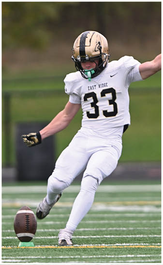 A football player running on the field. Description generated by AI
