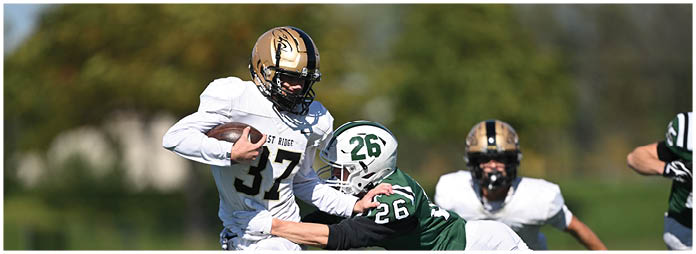 A football player is sliding on the ground. Description generated by AI