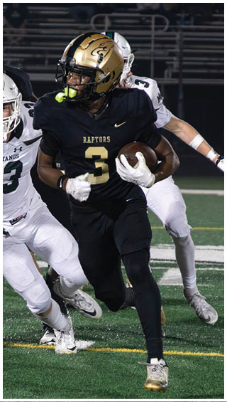 A football player running on the field. Description generated by AI
