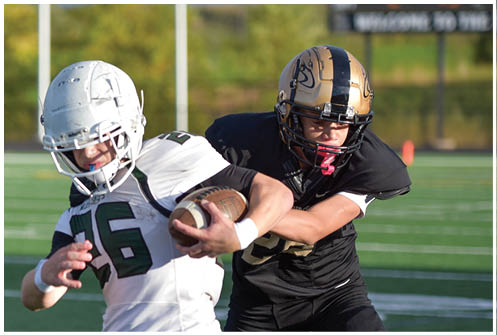 A football player is sliding on the ground. Description generated by AI