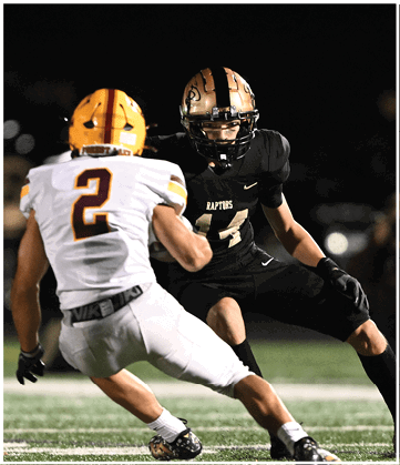 A football player running on the field. Description generated by AI