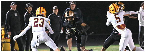 A football player is sliding on the ground. Description generated by AI