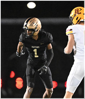 A football player running on the field. Description generated by AI