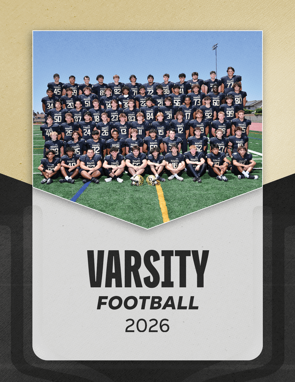 A group of football players sitting on a bench. Description generated by AI
