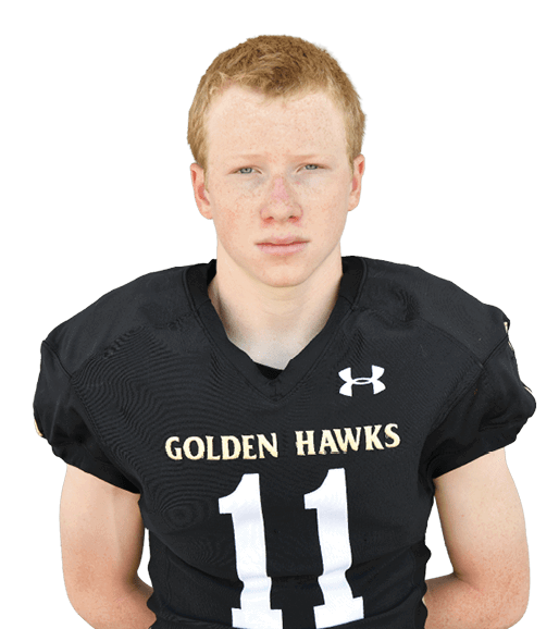 A person with short hair wearing a black football jersey with the number 11 and the words “Golden Hawks" stands facing forward against a white background. Description generated by AI