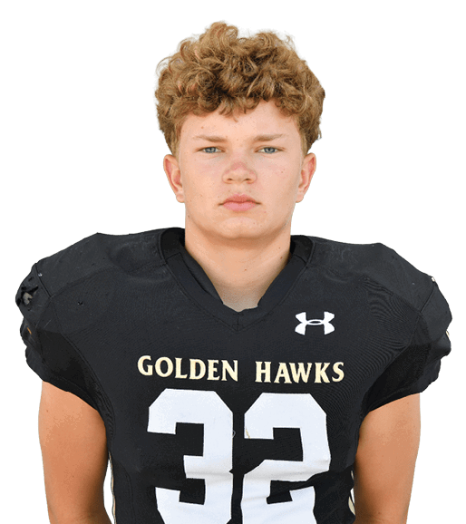 A person with curly hair wearing a black football jersey with the number 32 and the words “Golden Hawks" stands facing forward against a white background. Description generated by AI